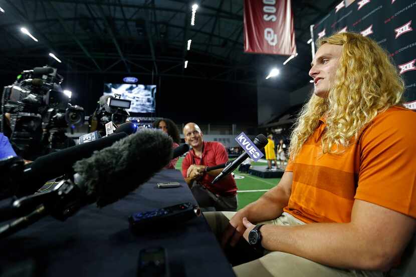 FILE - Texas defensive line Breckyn Hager talks with the media in a breakout session during...