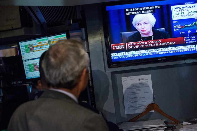 
A trader at the New York Stock Exchange watched last week as Fed Chairwoman Janet Yellen...