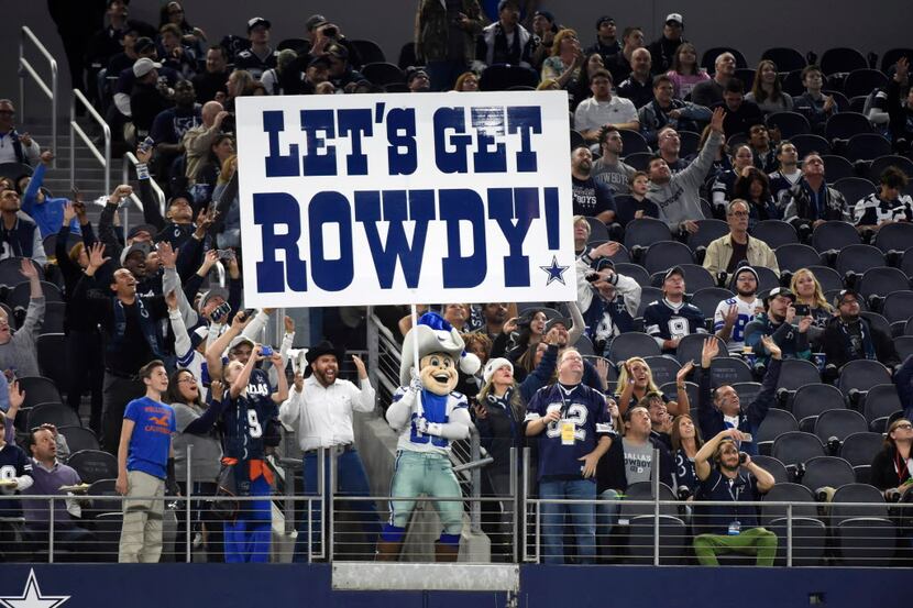 Dallas Cowboys mascot Rowdy motivates the fans before an NFL football game against the New...