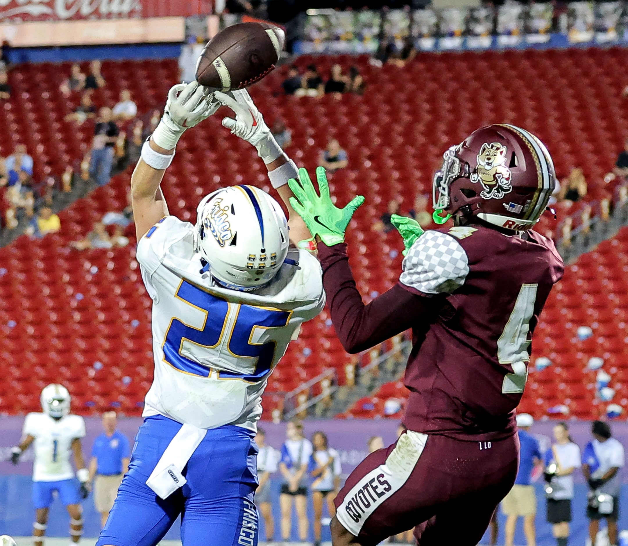 Frisco defensive back Josh Byrd (25) defends a pass intended for Frisco Heritage wide...