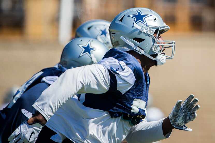 Dallas Cowboys defensive end Robert Quinn (58) runs during an afternoon practice at training...