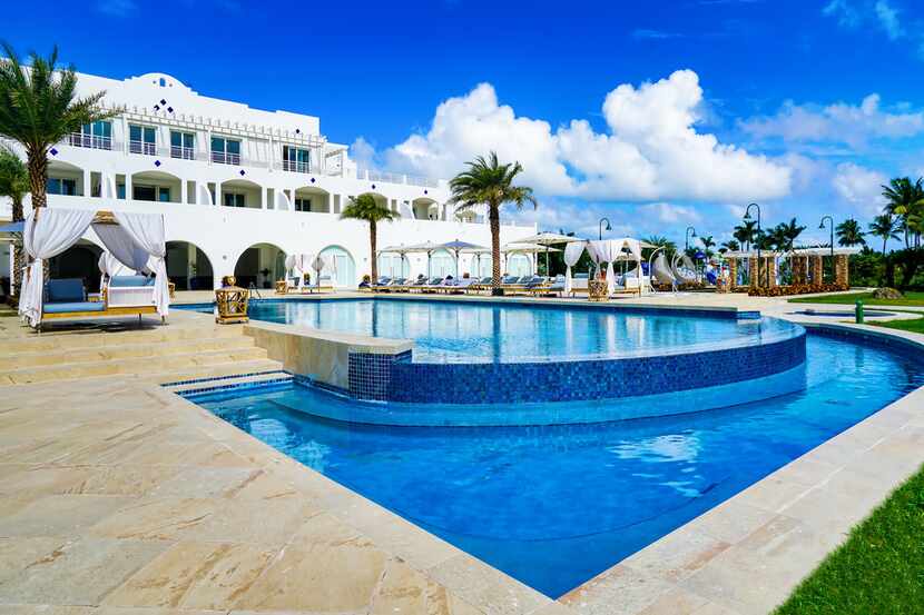 Relax poolside at Cuisinart Golf Resort and Spa, or head to Anguilla's fabulous white-sand...