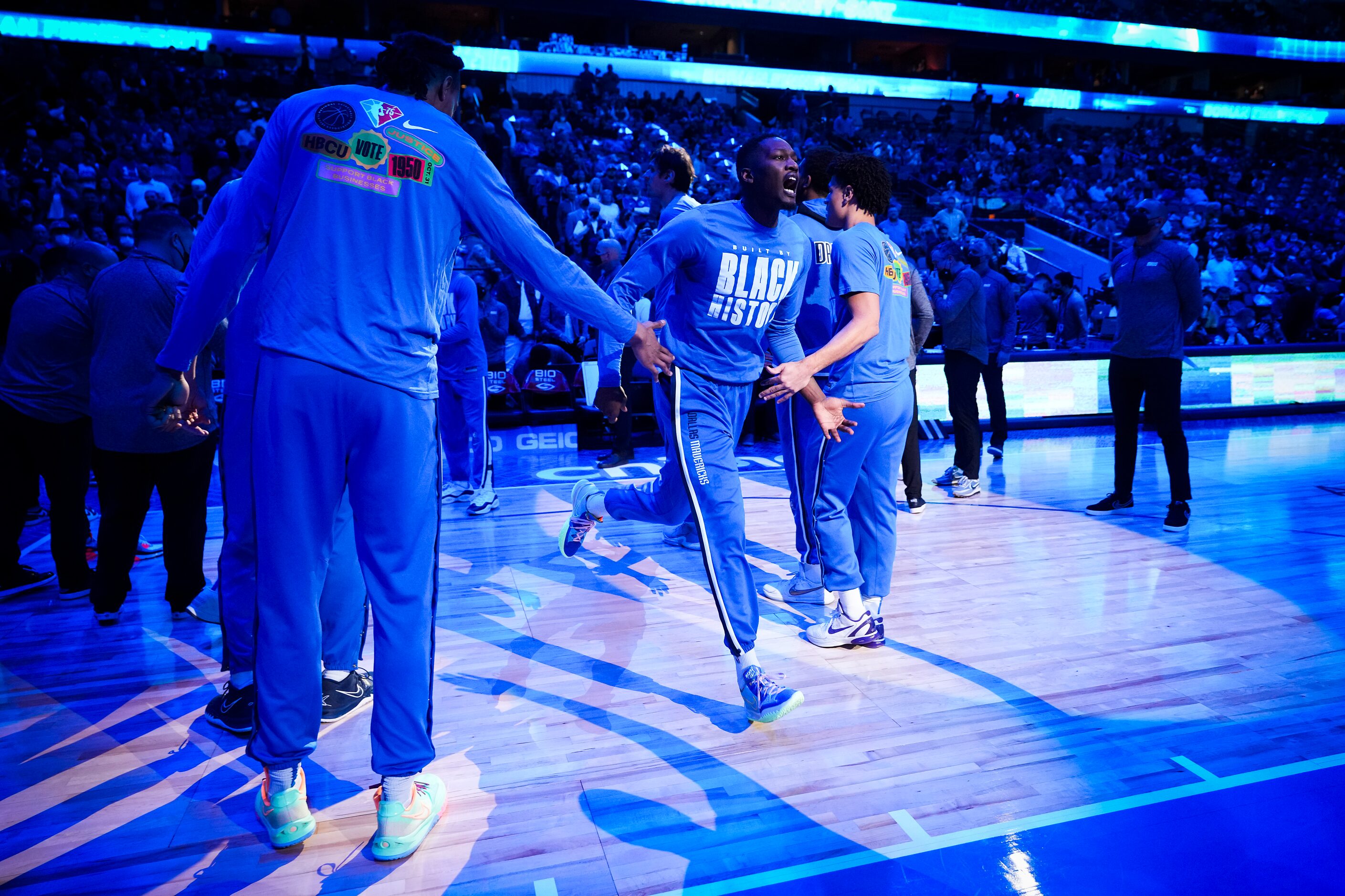 Dallas Mavericks forward Dorian Finney-Smith takes the court during pregame introductions...