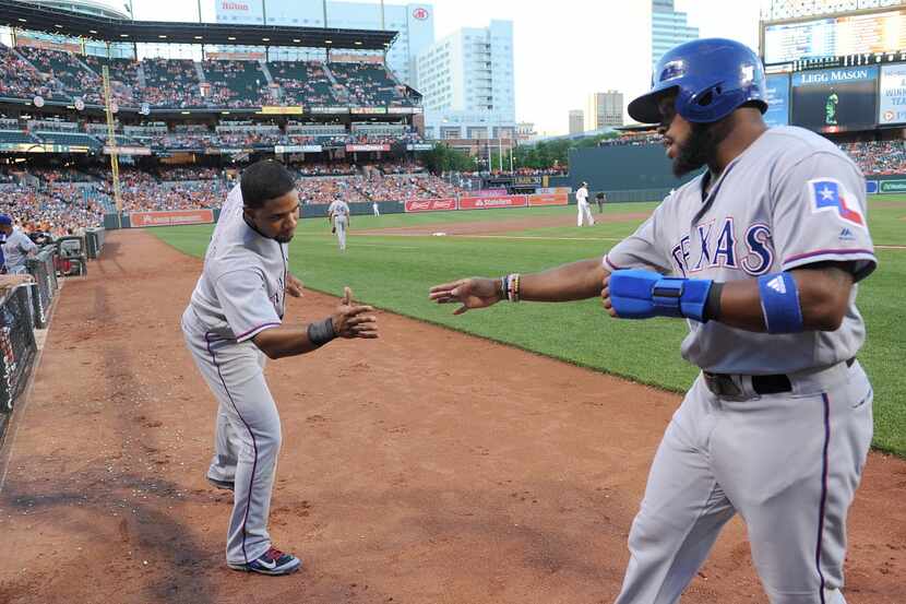 BALTIMORE, MD - AUGUST 04: Delino DeShields Jr. #3 of the Texas Rangers celebrates with...