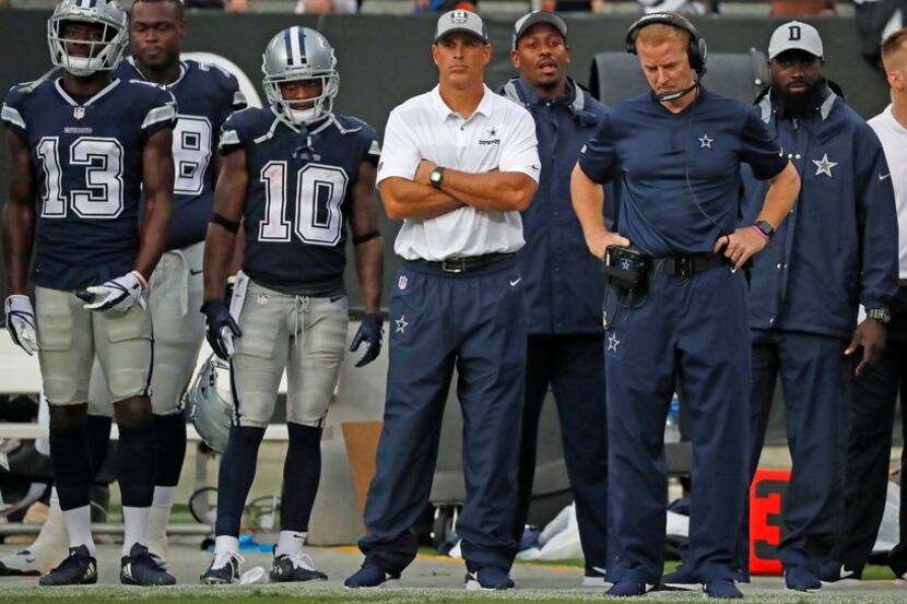 Dallas Cowboys head coach Jason Garrett watches the fourth quarter action from the sidelines...