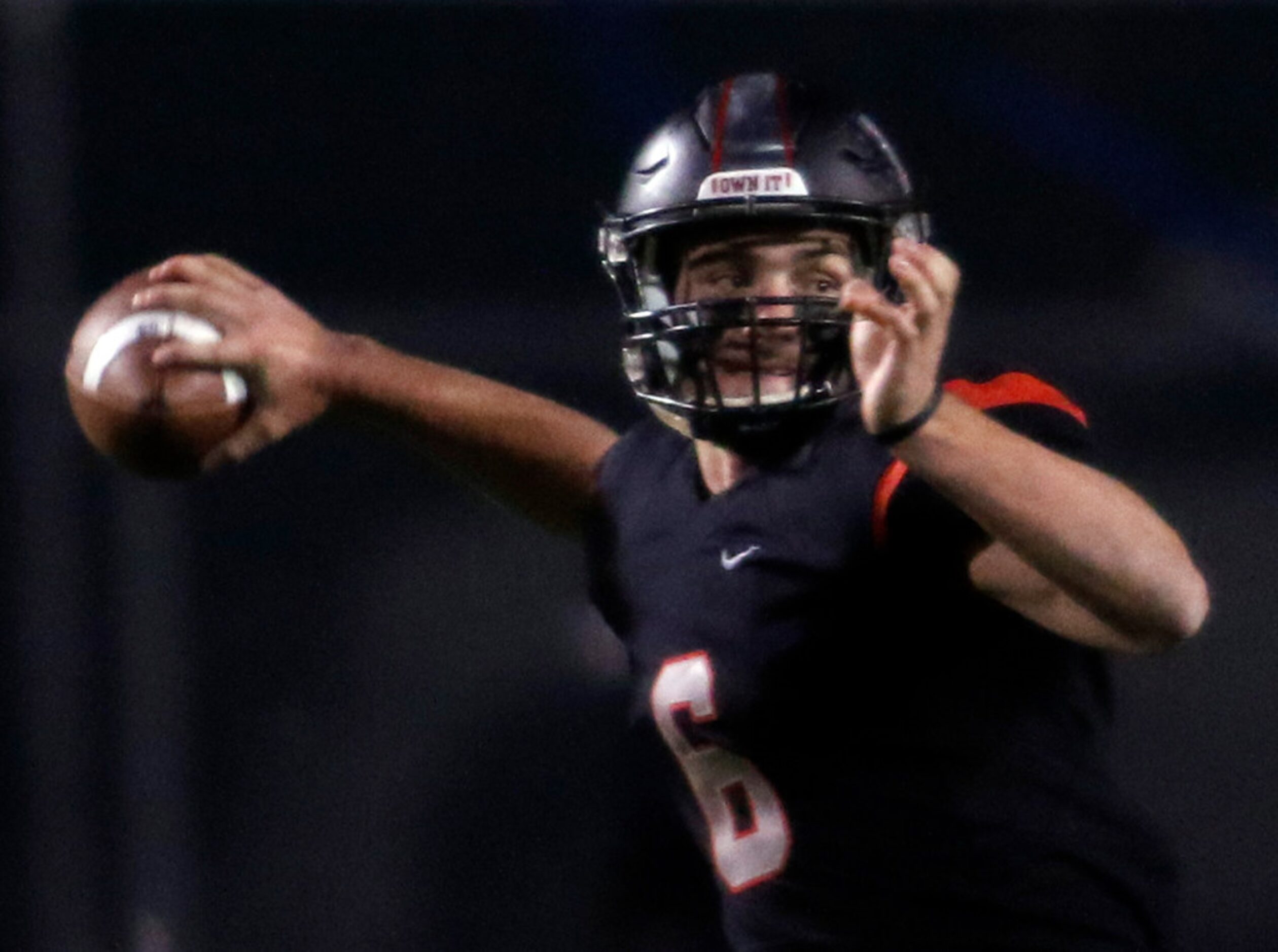 Lake Highlands head coach Mitch Coulson (6) launches a pass downfield during first half...