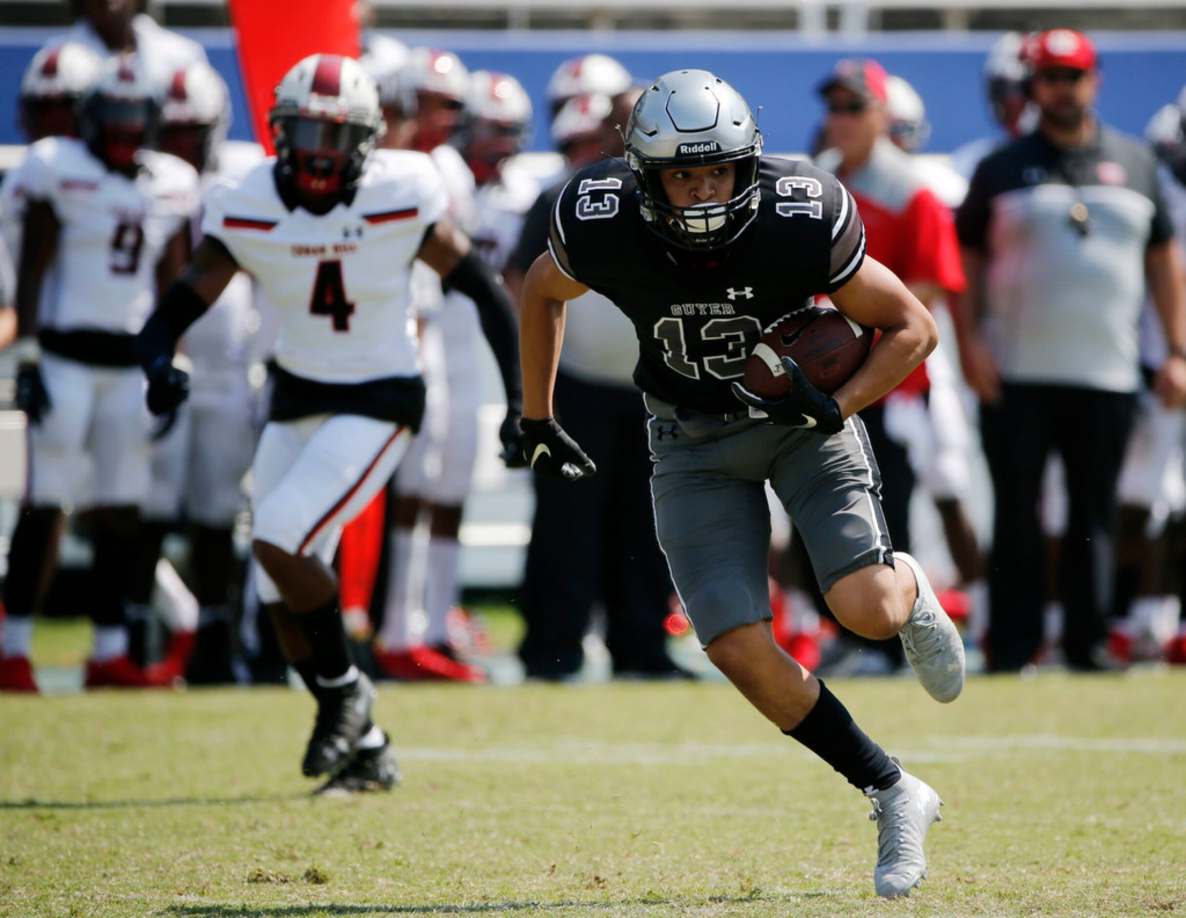 Denton Guyer receiver Brandon DeLeon (13) runs after a reception against Cedar Hill during...