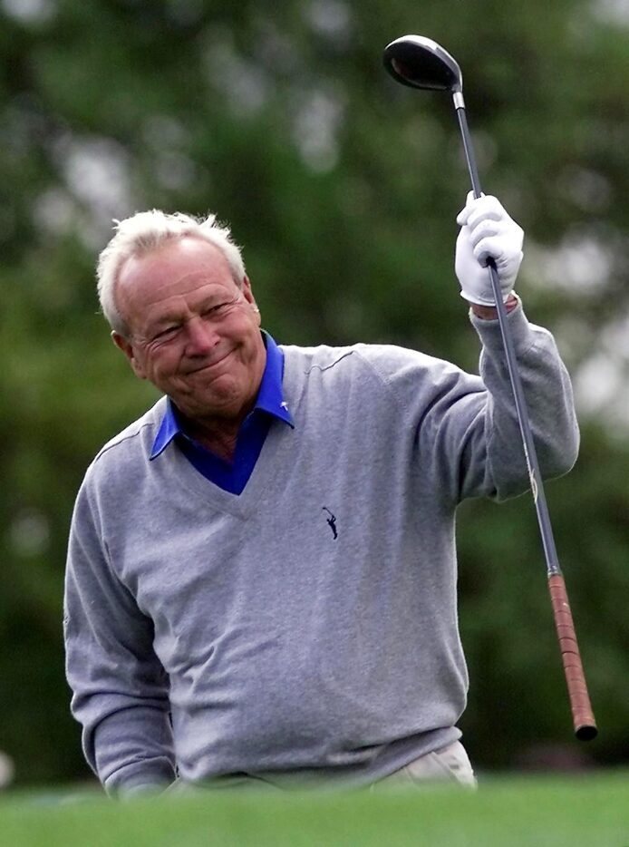 Arnold Palmer, always a fan favorite, waves to the crowd at the 2000 Masters Golf Tournament...