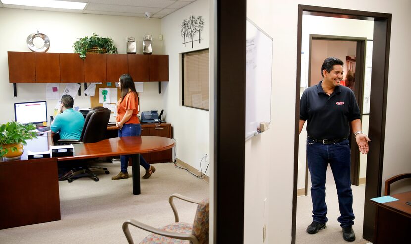 Head of business development Oscar DeLeon (left) and his daughter Danielle DeLeon work at a...