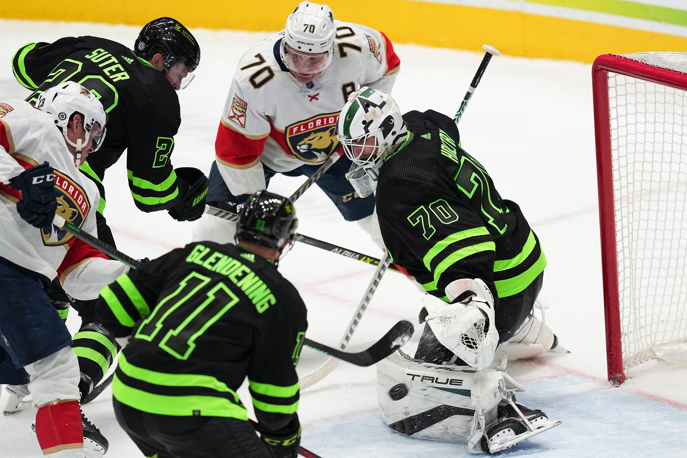 Dallas Stars goaltender Braden Holtby (70) makes a save against Florida Panthers center...