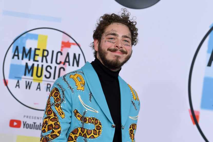 Post Malone arrives at the American Music Awards on Tuesday, Oct. 9, 2018, at the Microsoft...