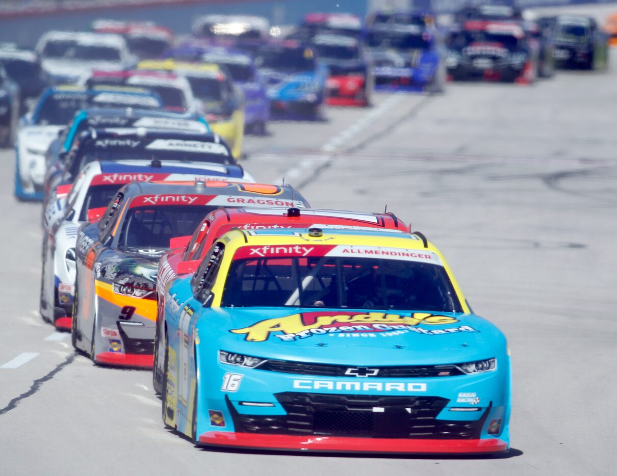 AJ Allmendenger (car #16) leads the field coming out of an early race re-start. The NASCAR...