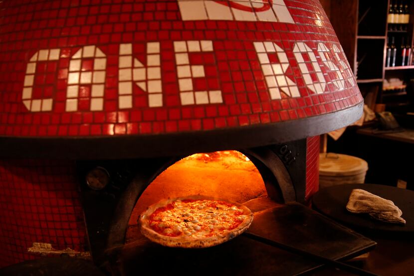 Food Network celebrity Guy Fieri visited Cane Rosso in Deep Ellum in a 'Diners, Drive-Ins &...