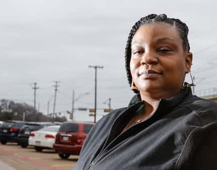 Kazia Cunningham poses for a portrait while waiting for her child to get out of School at...