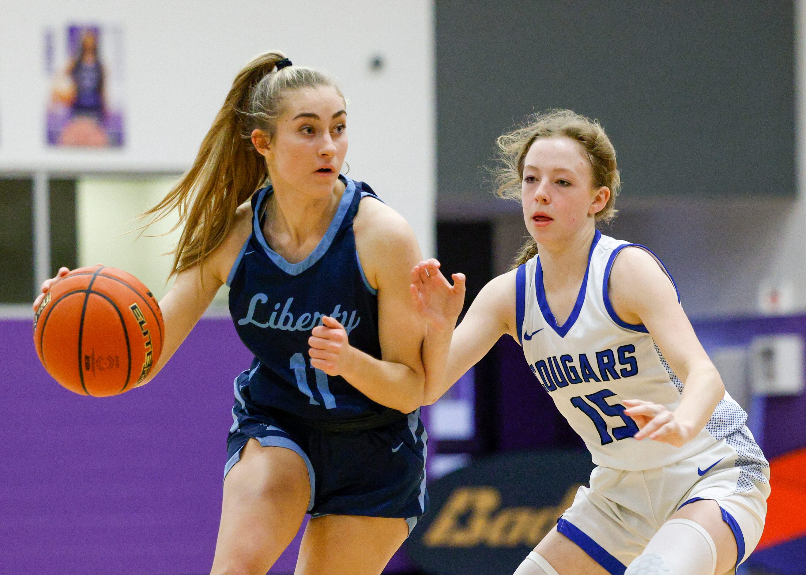 Argyle Liberty Christian guard Lauren Ullrich (11) dribbles past Tyler Grace Community guard...