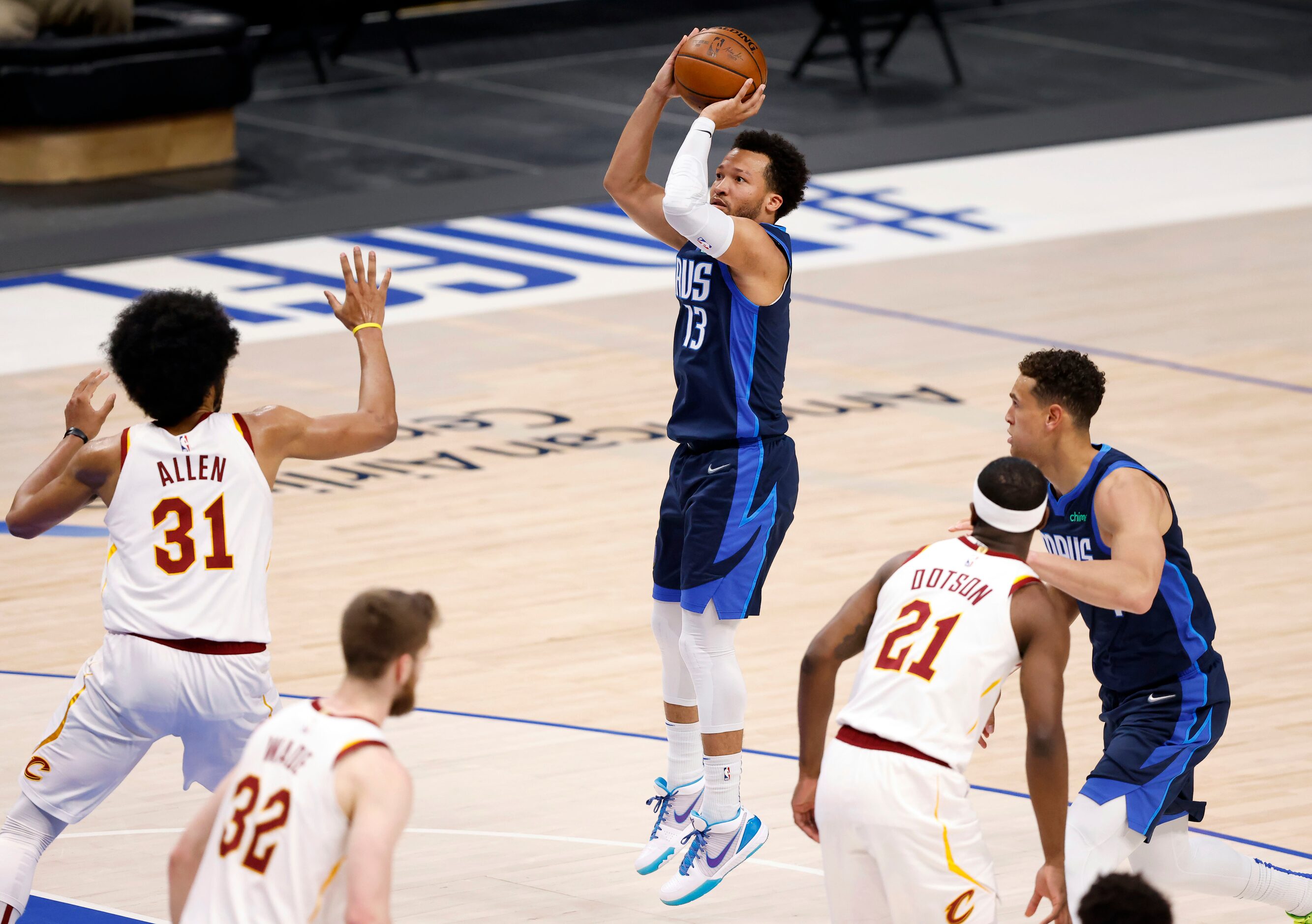 Dallas Mavericks guard Jalen Brunson (13) puts up an open jump shot against the Cleveland...