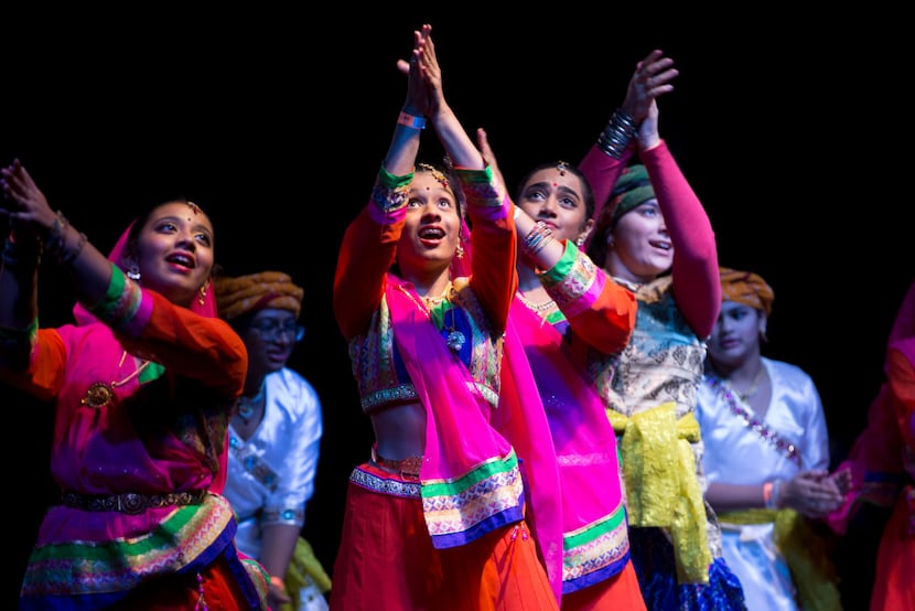 Performers on stage performing during Diwali Mela at Fair Park  in Dallas.