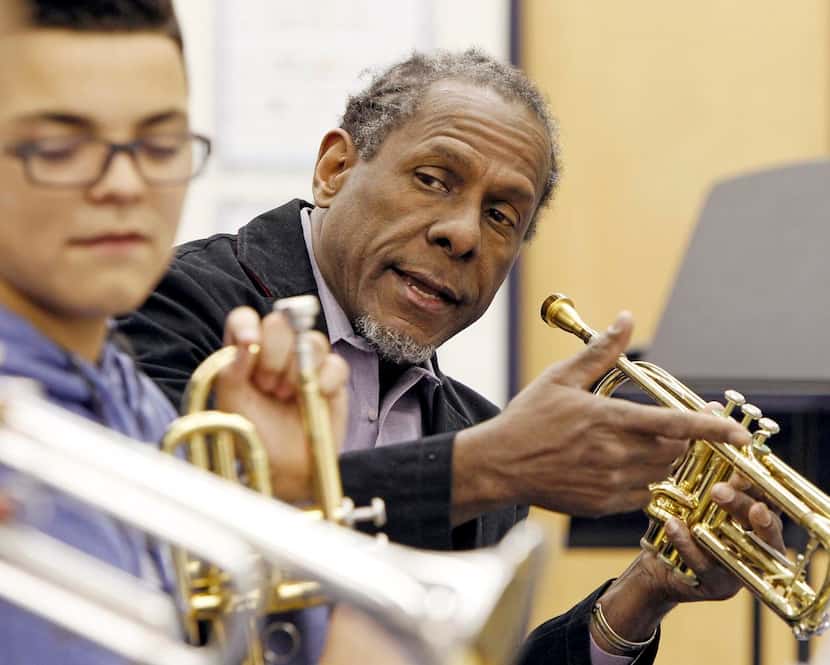 
Trumpets4Kids founder Freddie Jones gives instructions to his students during a music class...