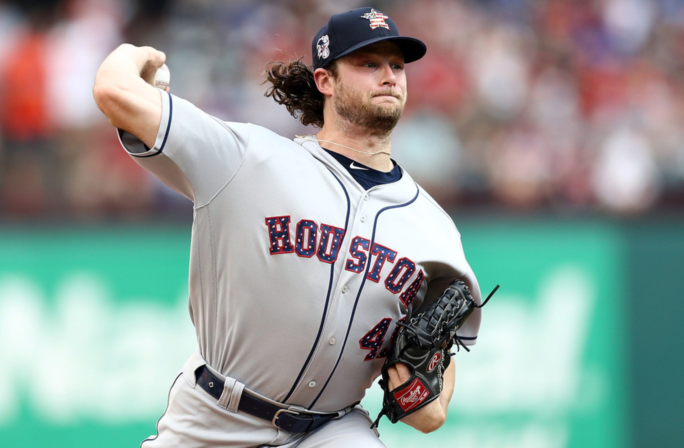 ARLINGTON, TX - JULY 04:  Gerrit Cole #45 of the Houston Astros throws against the Texas...