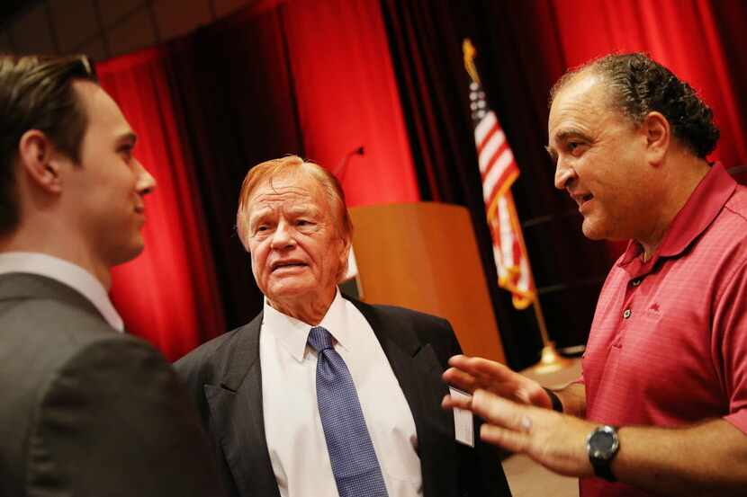 Frisco Mayor Maher Maso (right) spoke with Baxter Brinkmann (center) of Brinkmann Ranch and...