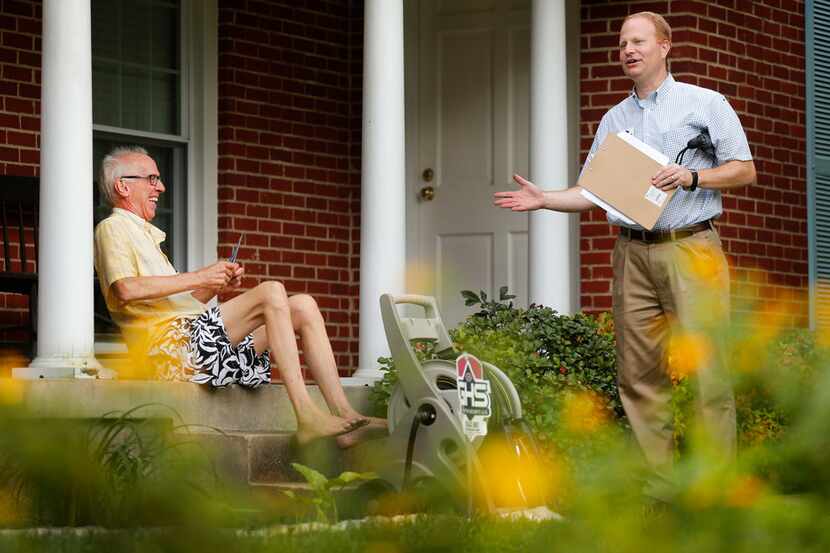 Democrat John Turner goes door-to-door in the Old Lake Highlands neighborhood in Dallas...