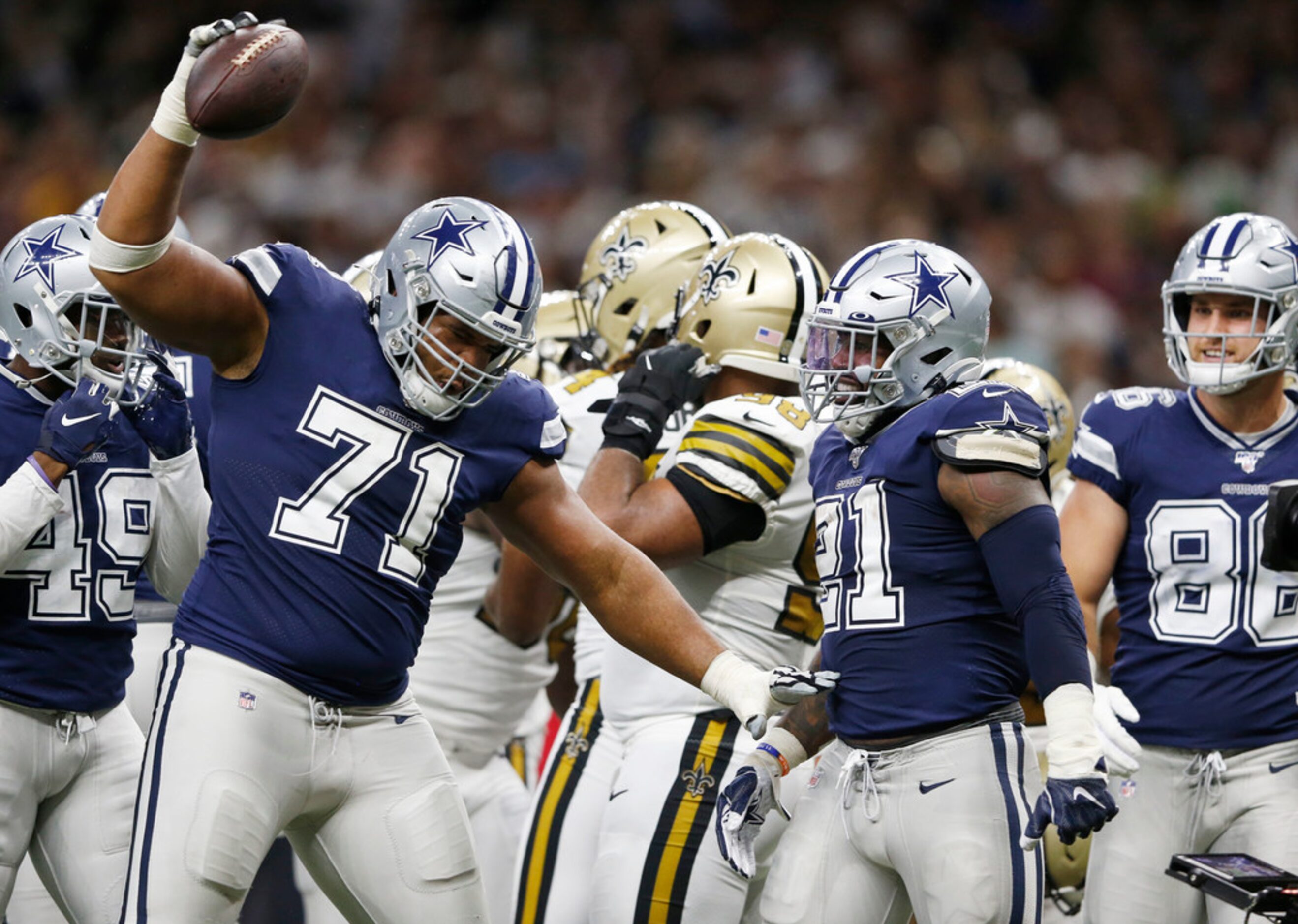 Dallas Cowboys offensive tackle La'el Collins (71) spikes the ball after Dallas Cowboys...