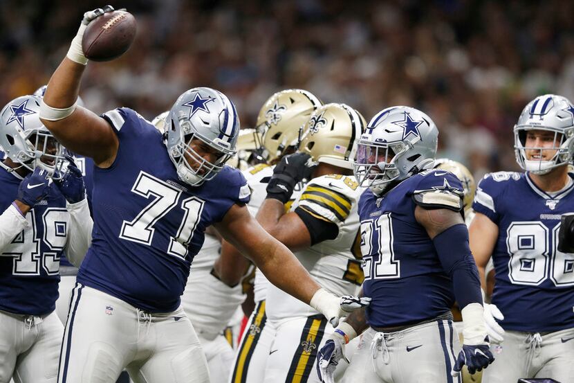 FILE - Cowboys offensive tackle La'el Collins (71) spikes the ball after running back...