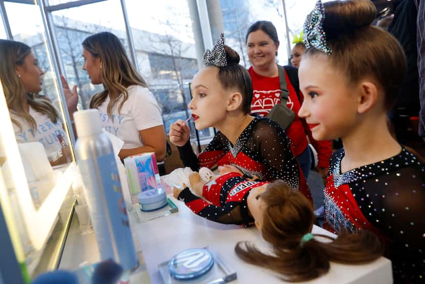 Stars Vipers-San Antonio teammate London Palmer, 9, (right) and her American Girl doll Becca...