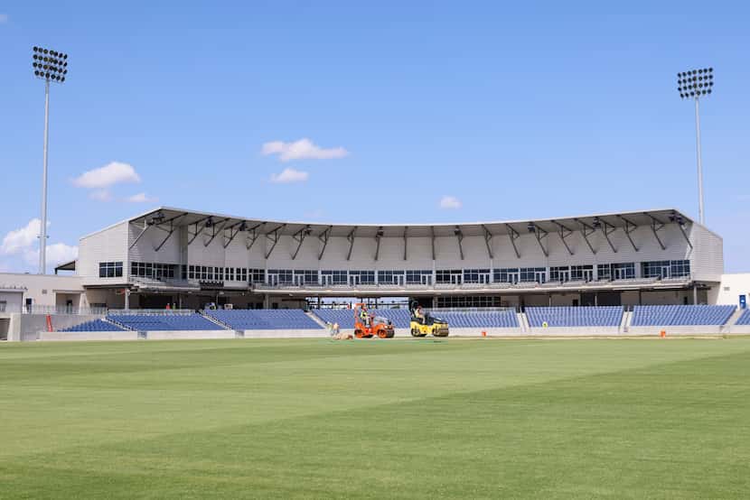 Groundskeepers curated a cricket pitch on Thursday, July 6, 2023, at Grand Prairie Stadium,...
