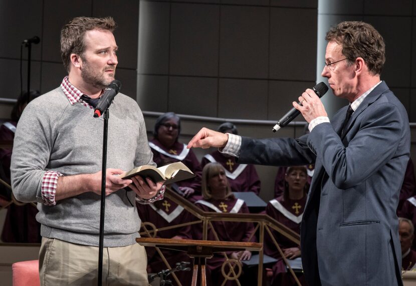 Steven Michael Walters (left) plays Associate Pastor Joshua and Chamblee Ferguson plays...