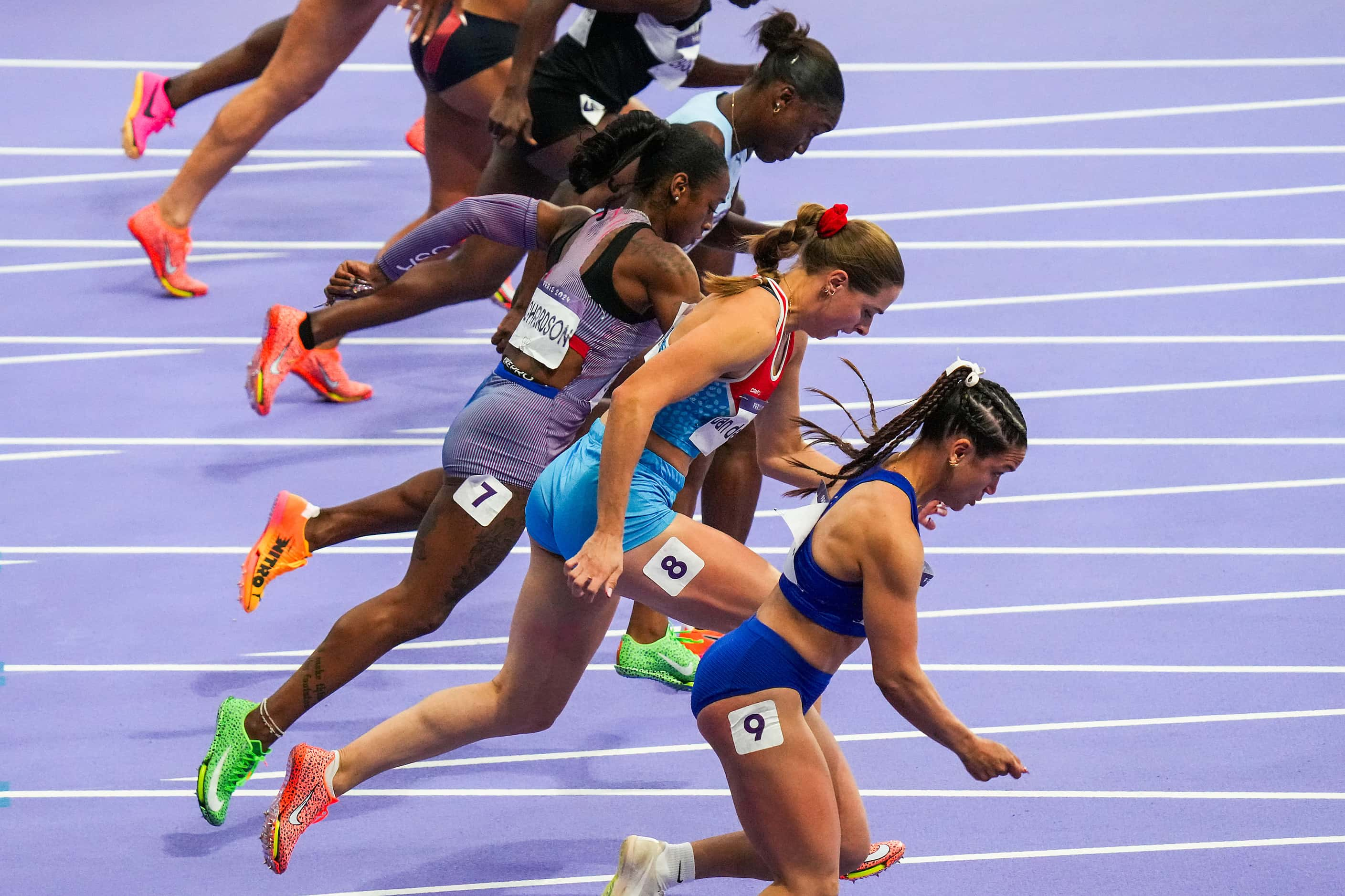 Sha'carri Richardson of the United States (7) comes off the start line of a women’s...