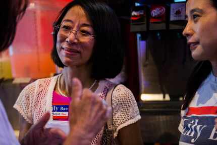 In this 2017 photo, then-Plano mayoral candidate Leilei "Lily" Bao talks with supporters at...