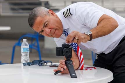 Southwest Airlines pilot Ernie Meeks sets up his camera to record behind the scenes content...