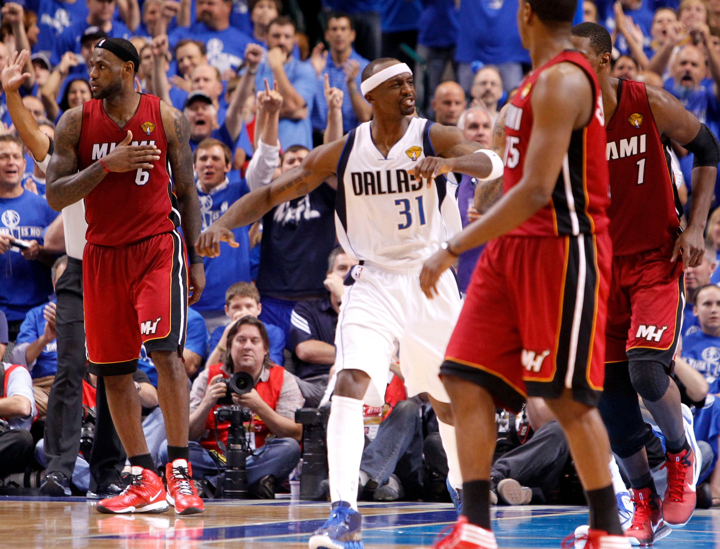 Dallas Mavericks shooting guard Jason Terry (31) shows some attitude as he heads upcourt...