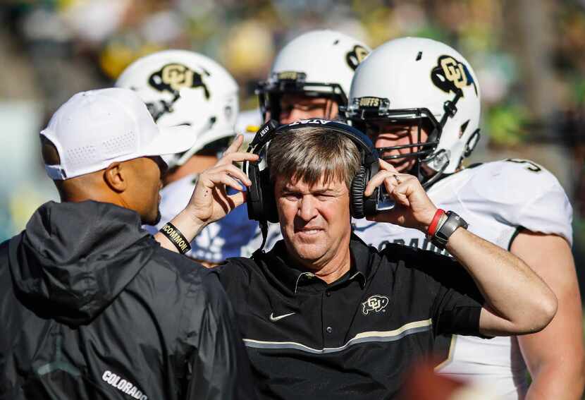 FILE - In this Sept. 24, 2016, file photo, Colorado coach Mike MacIntyre stands on the...