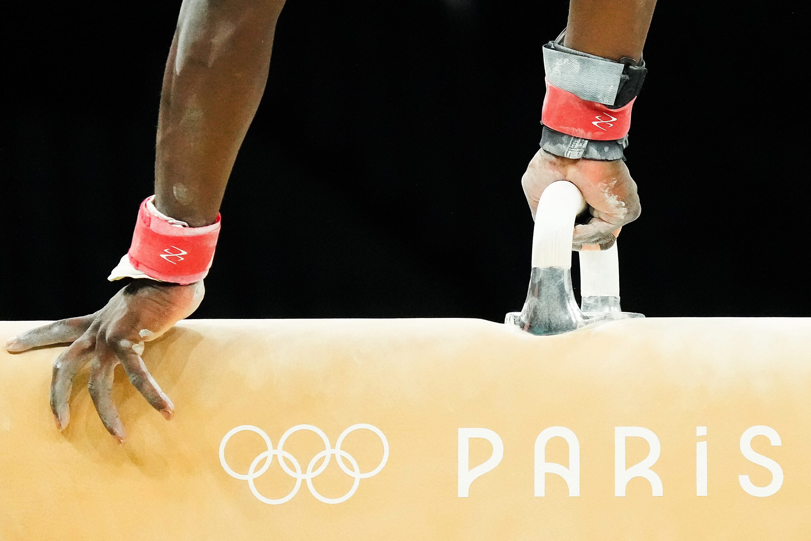 Frederick Richard of the United States works on the pommel horse during gymnastics podium...