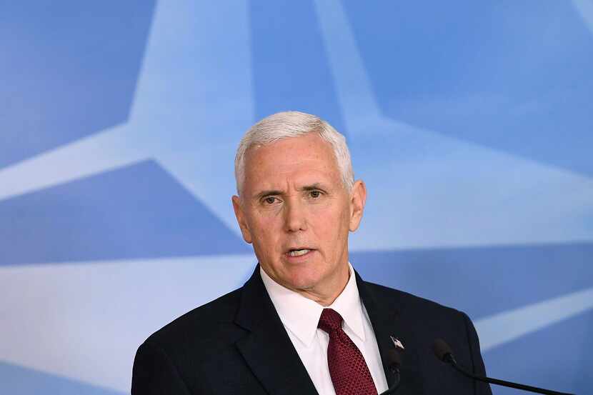 Vice President Mike Pence speaks during a press conference after a meeting with NATO...