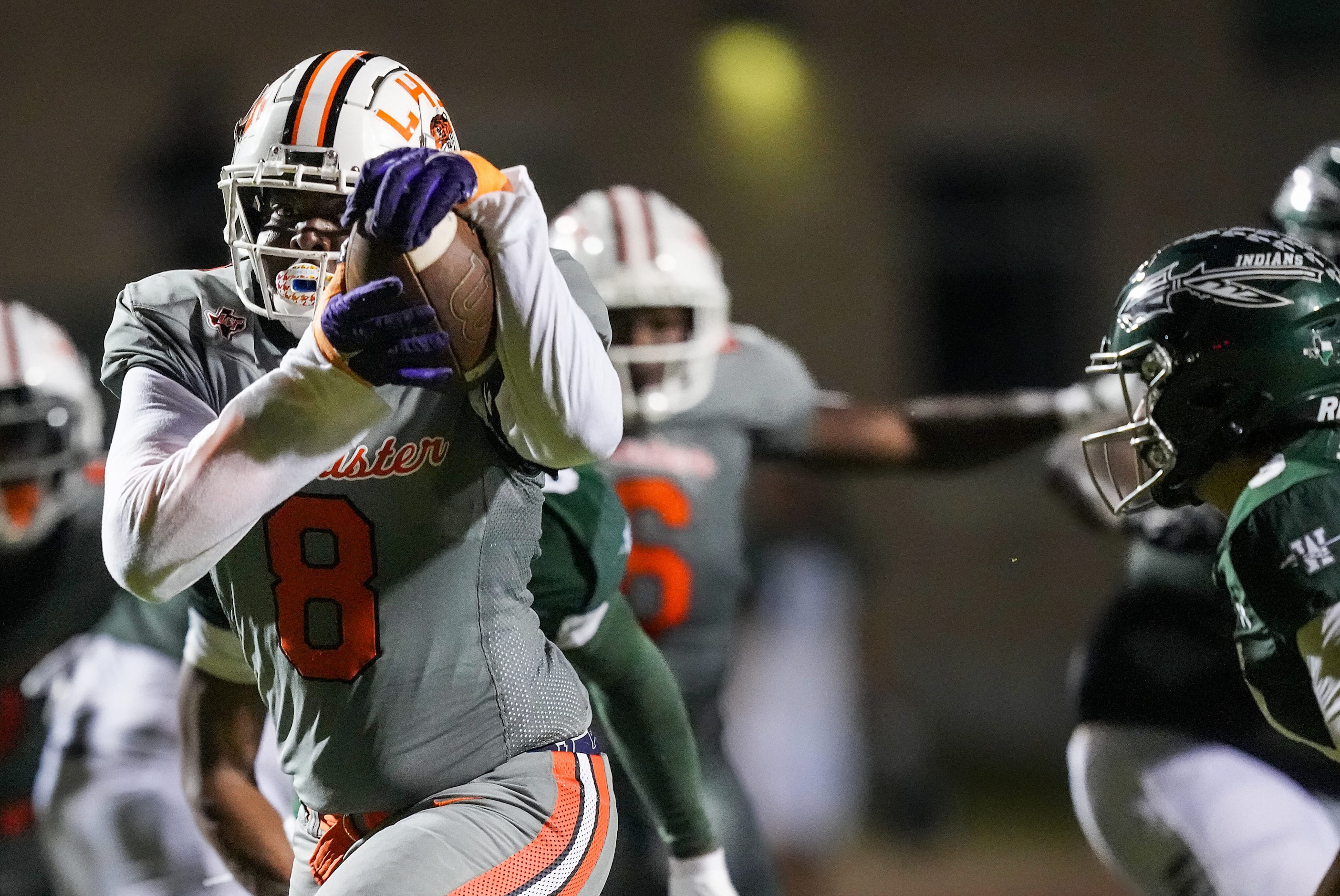 Lancaster defensive lineman Jaydan Shaw (8) intercepts a pass by Waxahachie quarterback...