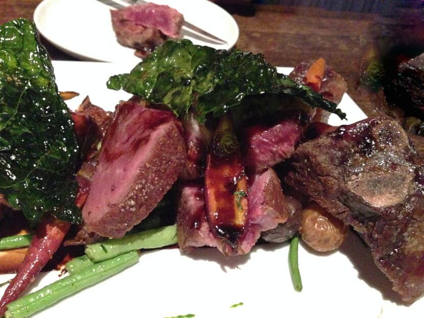 45-day bone-in ribeye with marble potatoes, trumpet mushrooms, green beans and fried kale at...