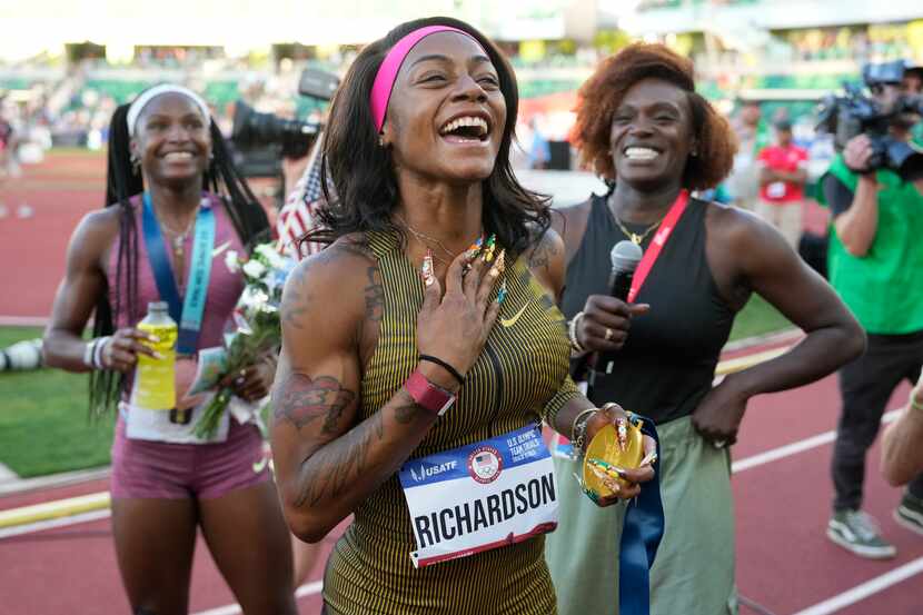 Sha'Carri Richardson celebrates her win in the wins women's 100-meter run final during the...