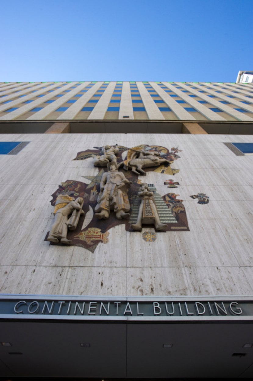 Front view with sculpture by artis Millard Sheets on the Mercantile Continental Building.