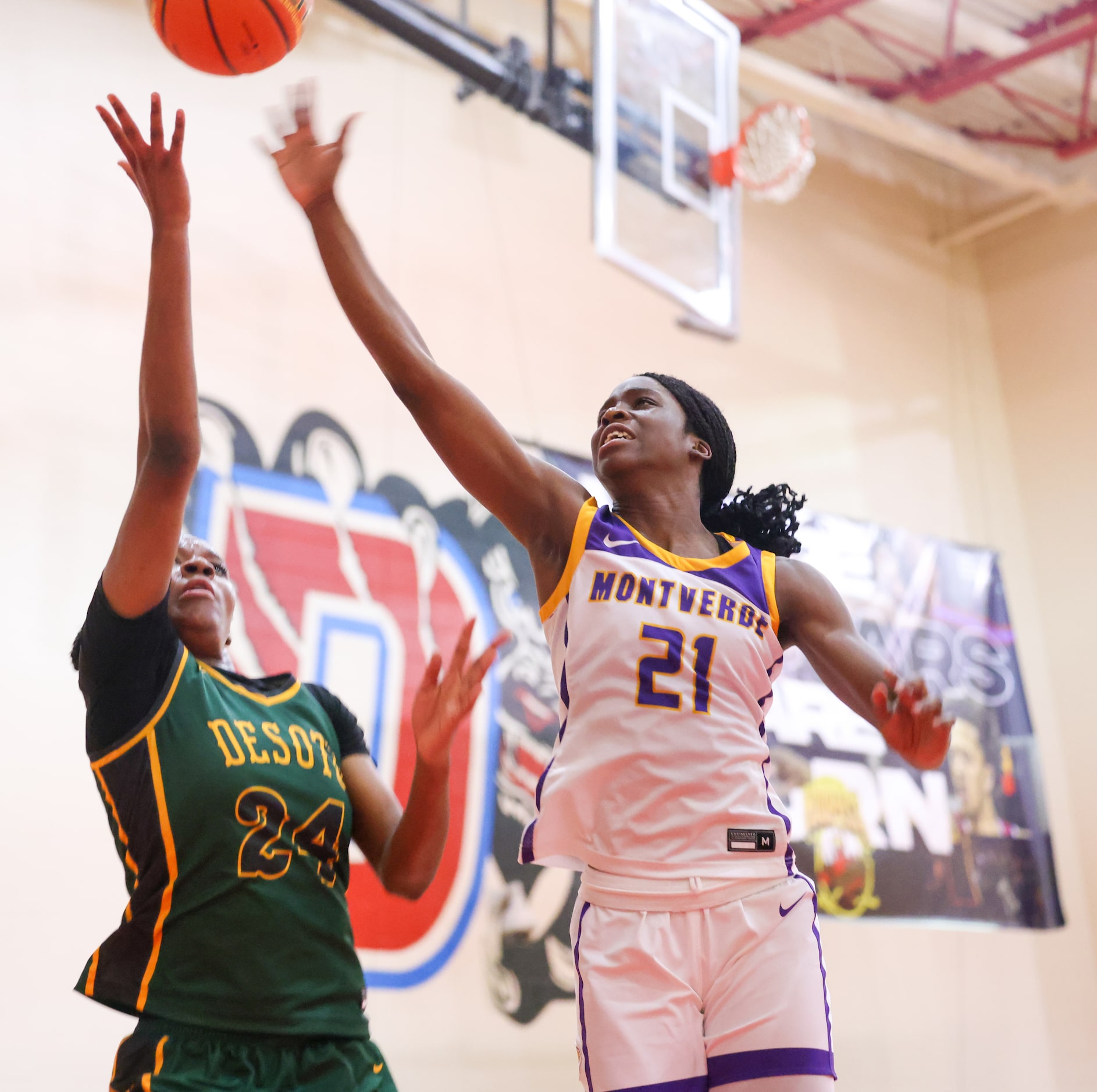 A shot by DeSoto small forward Amari Byles (24) is blocked by Montverde Academy Vivian...