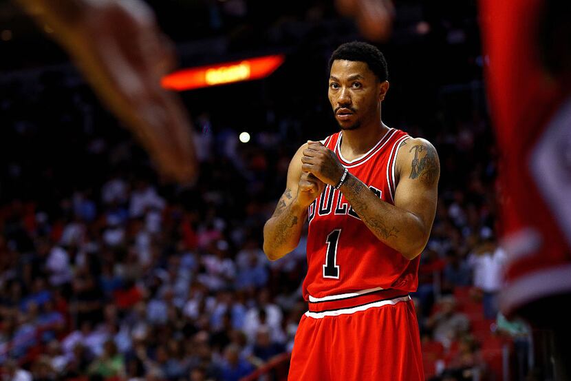 MIAMI, FLORIDA - APRIL 07:  Derrick Rose #1 of the Chicago Bulls looks on during a game...