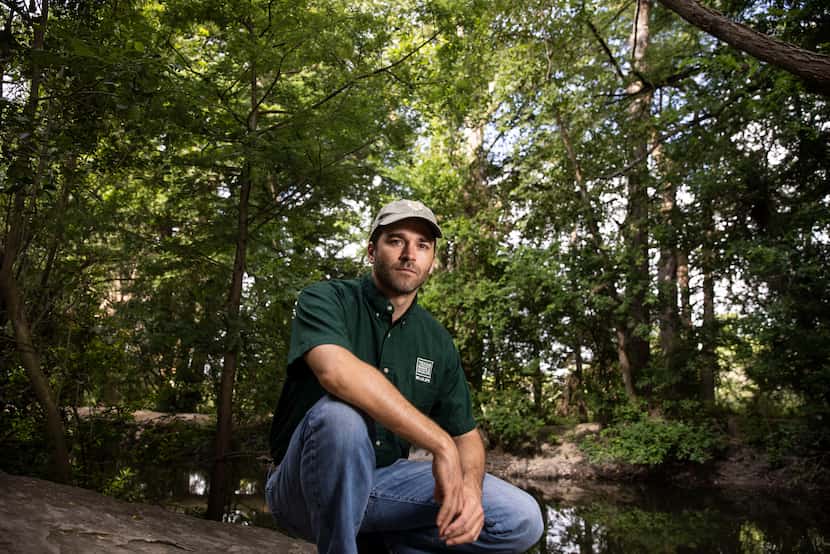 Texas Park and Wildlife State Mammalogist Jonah Evans poses for a portrait at the Cibolo...