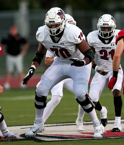 Melissa offensive lineman Trevor Goosby (70) looks to make a block against Argyle during...