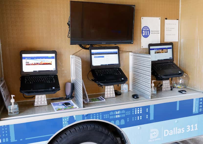 The “City Hall on the Go” unit has three laptops that residents can use to address issues...