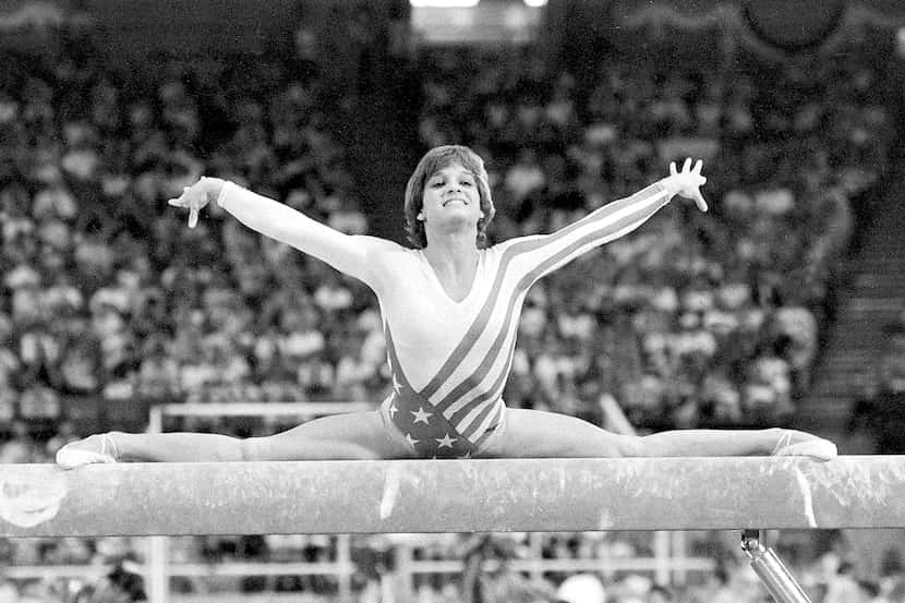 FILE - Mary Lou Retton, of the United States, performs on the balance beam during the...