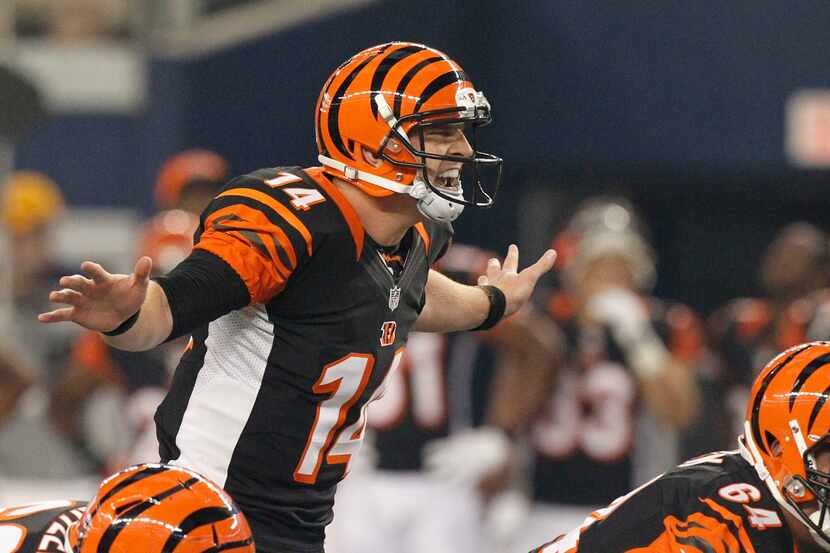 Cincinnati Bengals quarterback Andy Dalton (14) runs the offense against the Dallas Cowboys...