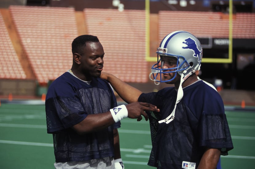 FILE — Barry Sanders and Emmitt Smith talk before Pro Bowl practice at the 1994 Pro Bowl at...