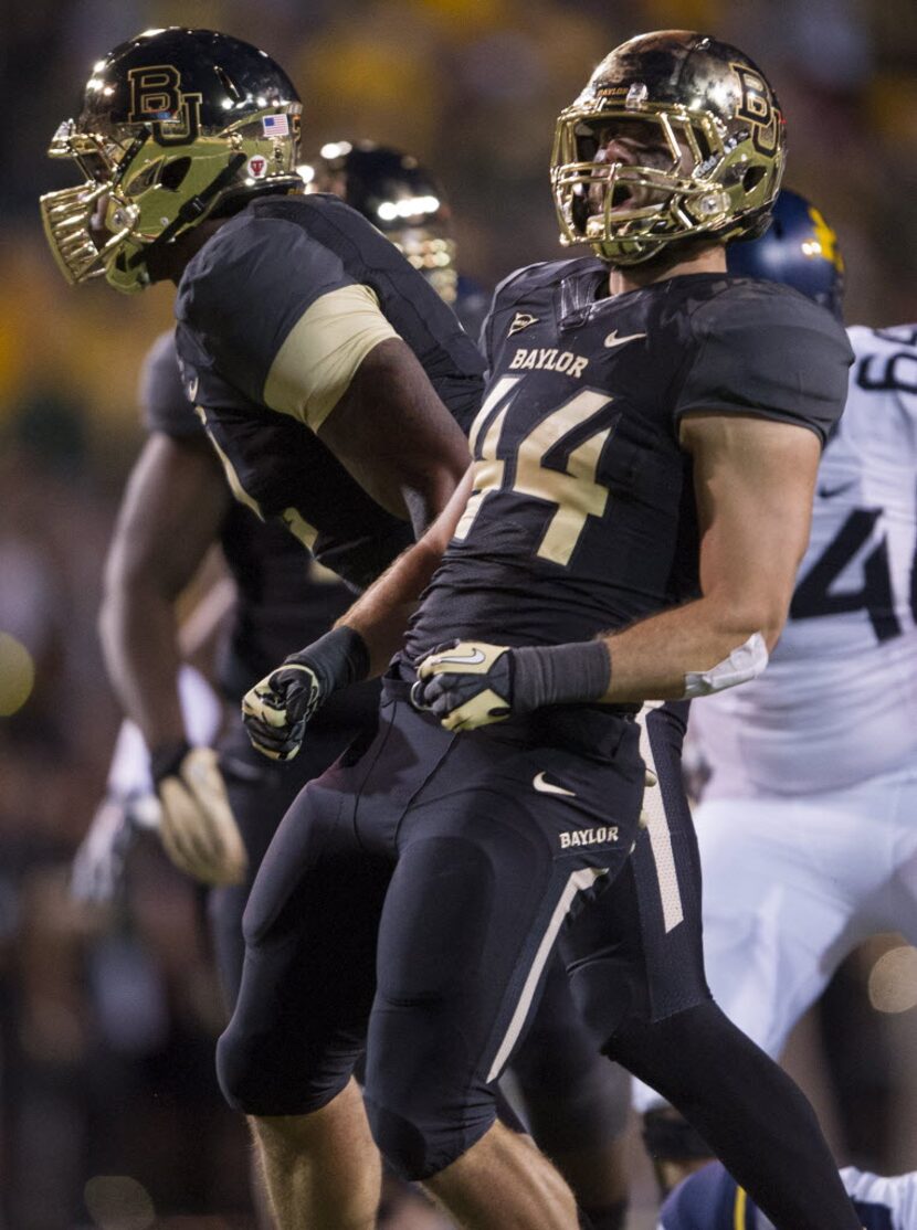 Oct 5, 2013; Waco, TX, USA; Baylor Bears linebacker Bryce Hager (44) celebrates his sack of...